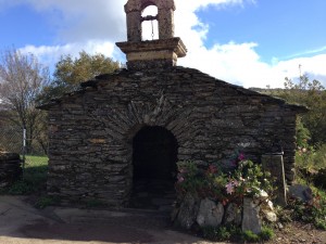 Can you see the hiking boot at the "altar" of flowers?